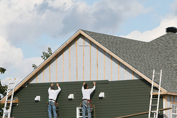 Professional Siding Contractor technician working in Cedar Grove, FL